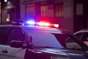 Huntington, WV Police car investigating multi car crash