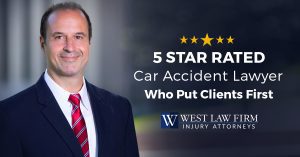 Charleston, WV car accident lawyer Brooks West in a suit and tie.
