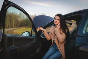 Young woman stranded on the side of the road in West Virginia after being sideswiped in car accident.