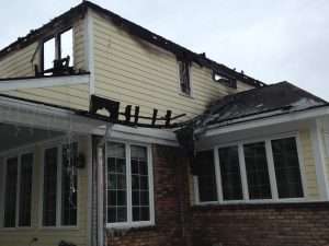 Two story house badly damaged in West Virginia fire.