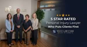 West Law Firm personal injury attorneys standing in their office with five star rated lawyer text highlighting client-focused legal services