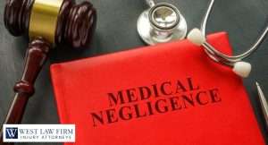 Medical negligence legal concept with gavel, stethoscope, and red case folder for a medical malpractice injury attorney claim